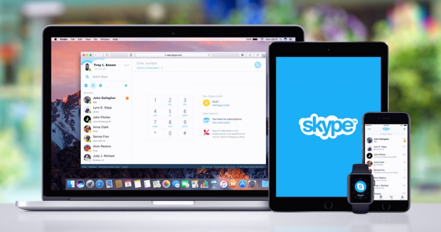 Skype messenger on Apple MacBook Pro, splash screen with Skype logo on iPad Pro, Skype app on iPhone 7 and Skype notification icon on Apple Watch