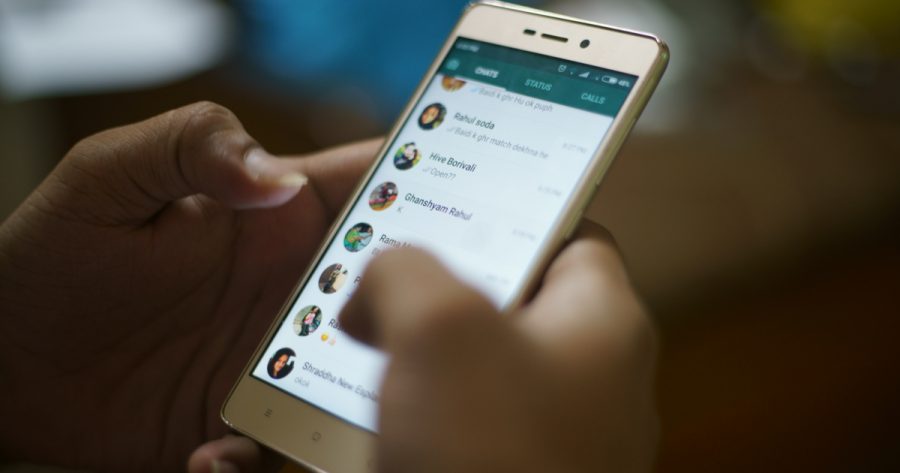 WhatsApp application on his cell phone